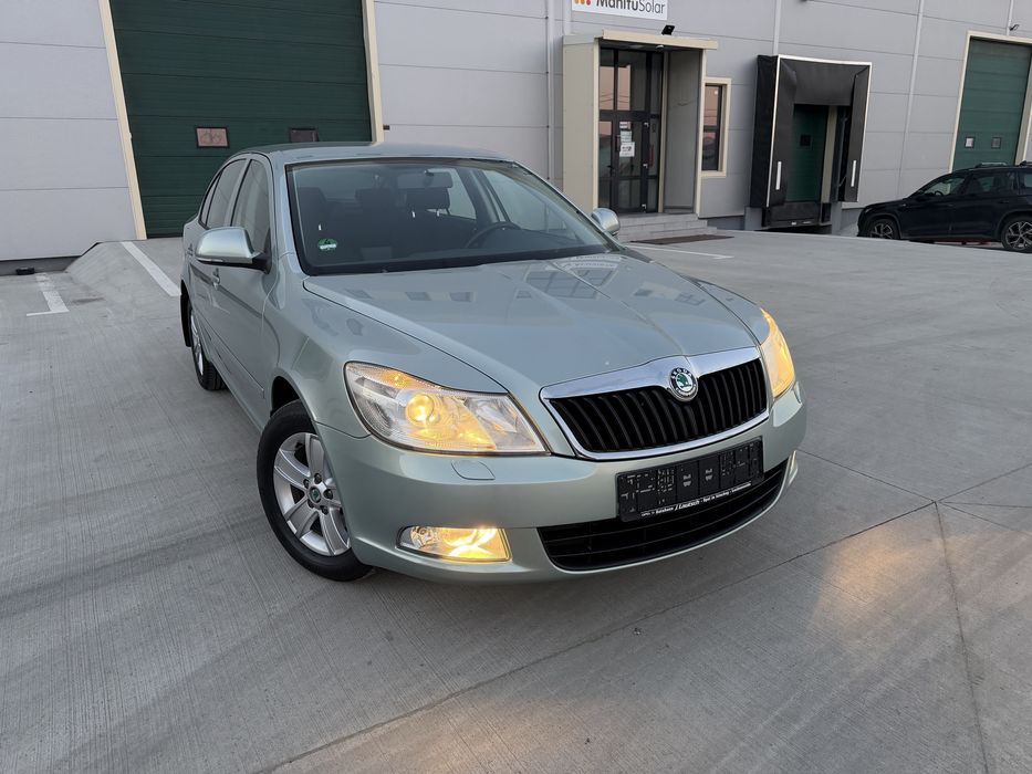 • Skoda Octavia •Model Elegance • 1.4 TSI • 122 CP • An 2011 • Euro 5 • Impecabila •