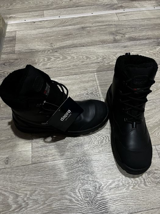 Продам новые зимние ботинки