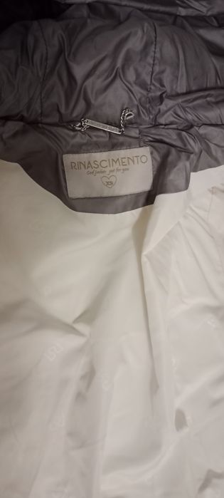 Продам пуховик женский