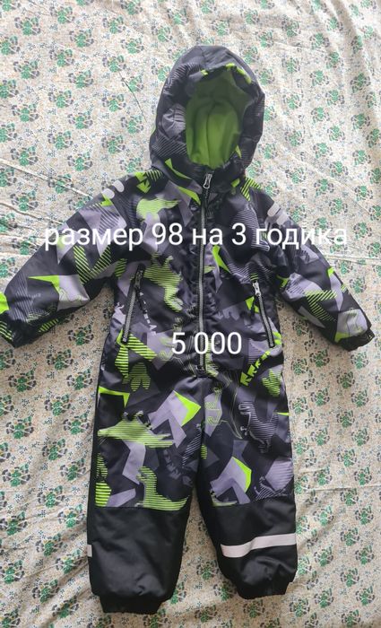 Четыре зимних комбинезона б/у.