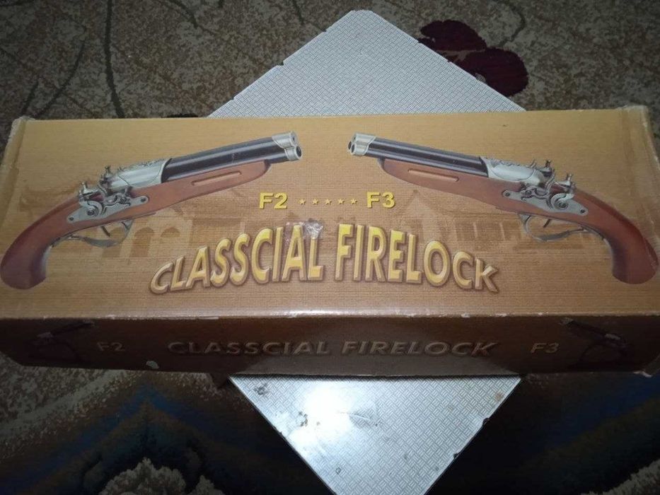 сувенир пистолет зажигалка