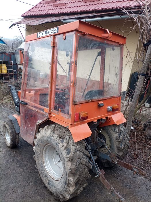 Tractoras Holder