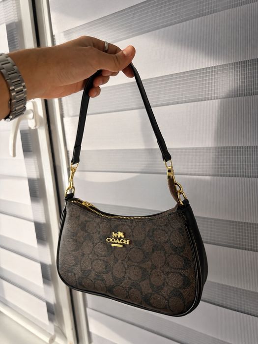 Сумка кросс-боди Coach
