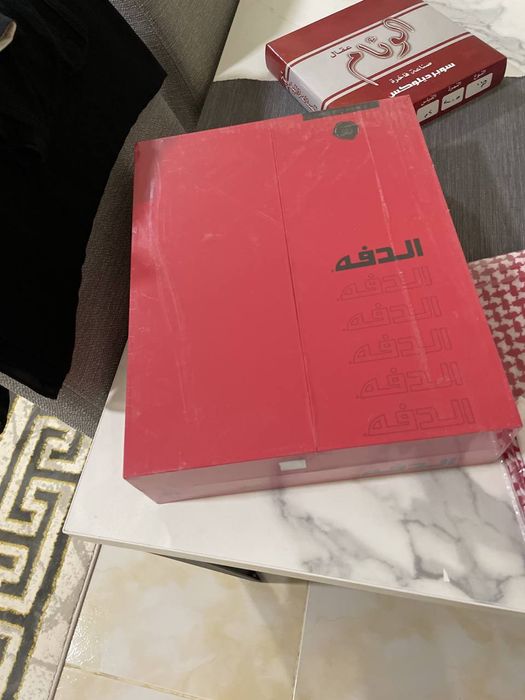 Новая одежда в упаковке из Мекки для истинных мужчин.