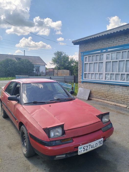 Продам машину Мазда 323