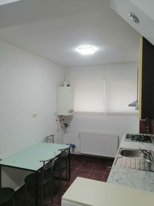 Apartament de inchiriat zona centrala cu loc de parcare . Str General Christin tell
