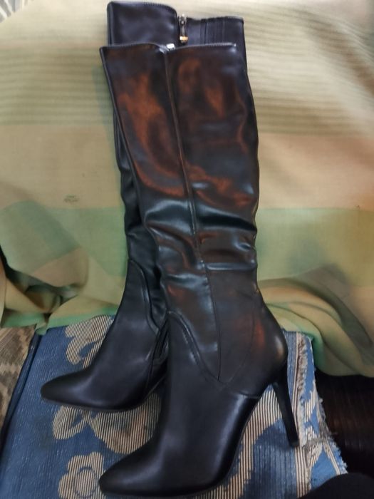 Продам новые сапоги