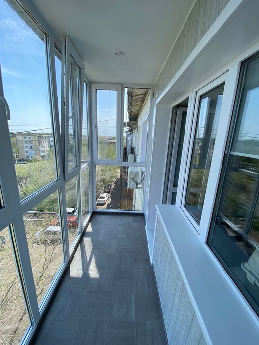 Пластиковые окна балконы