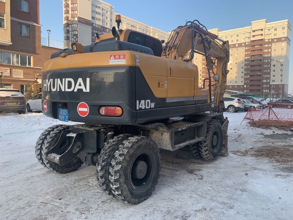 Аренда колесного экскаватора