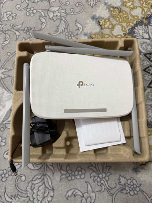 Продам роутер TP-LINK EC220-G5