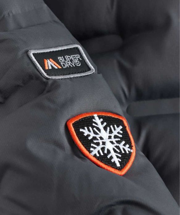 Въгленово сиво - Ватирано пухено якето Superdry NEXT за момче