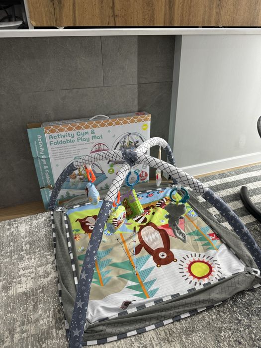 Развивающей коврик для новорожденных