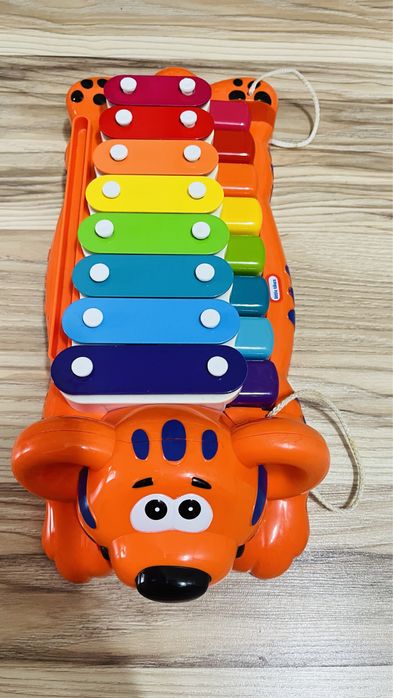 Продам игрушку Тигр пианино