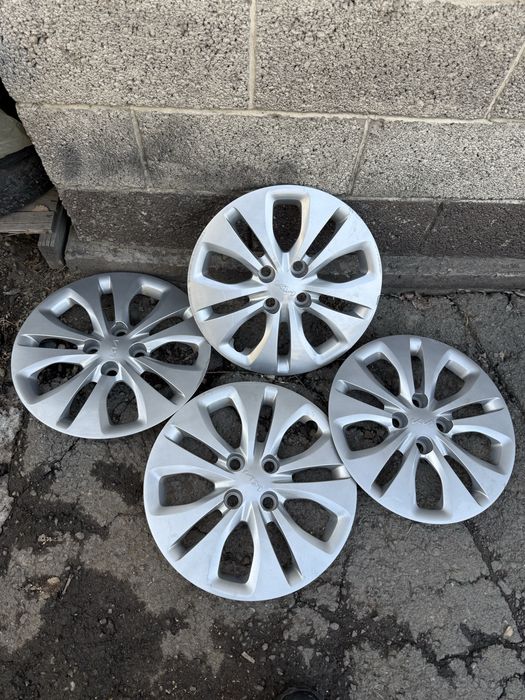 Колпаки Акцент , Кия