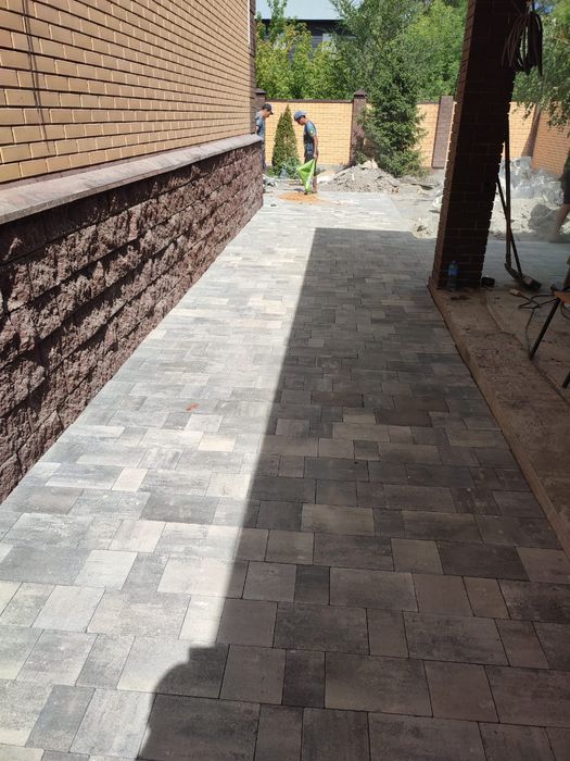 Благоустройства Укладка брусчатки