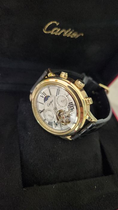 Мужские золотые часы Cartier