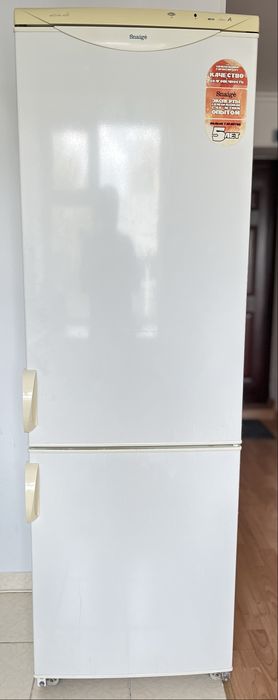 Продам 2х камерный холодильник “Snaige”