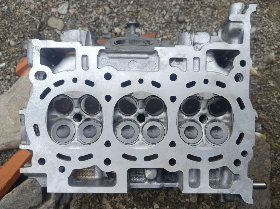 Chiuloasă Logan, capac distribuție