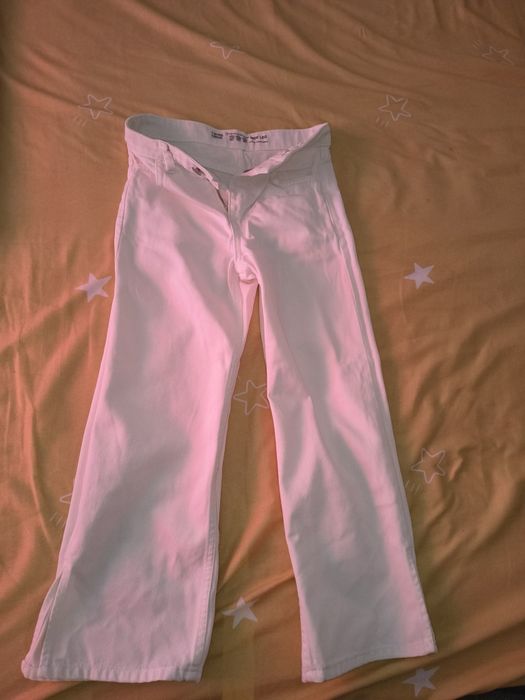 De vânzare pantaloni de blugi