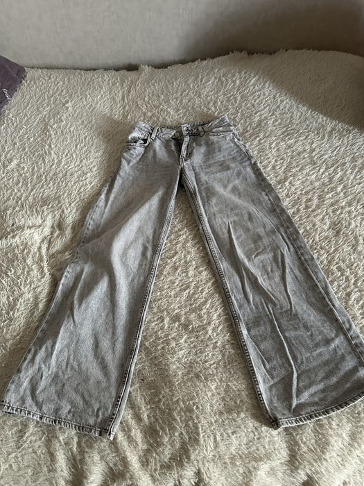 Джинсы,серого цвета