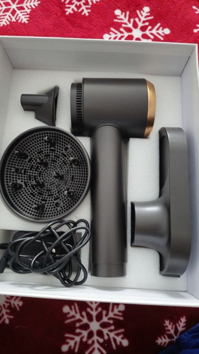 Uscător de păr portabil