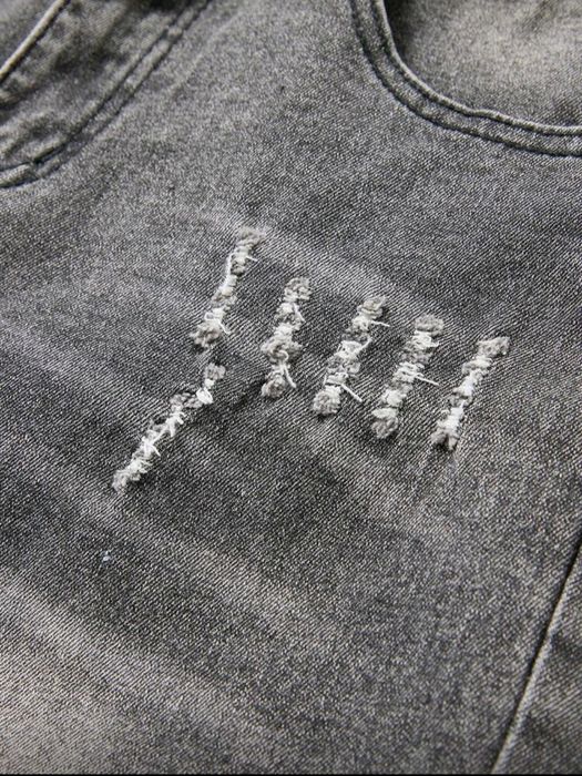 Blugi slim fit rupți pentru bărbați,de culoare gri.