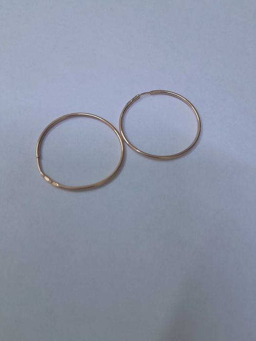 Продам золотые серьги