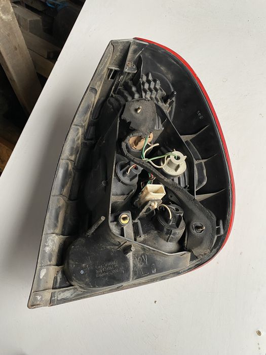 Ляв стоп Toyota Corolla 97-99г хечбег