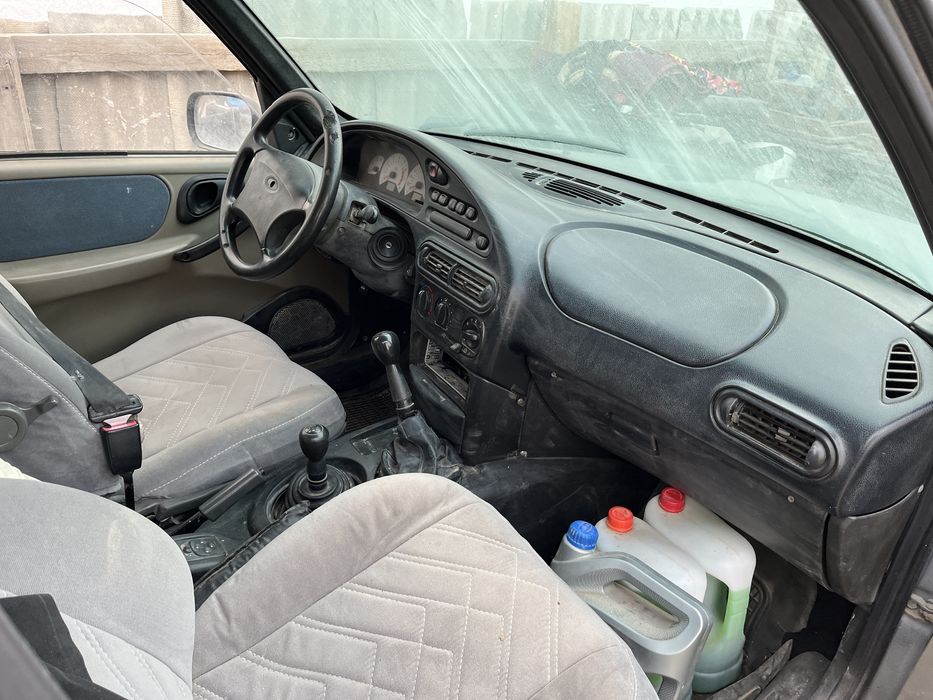 Шевролет    Нива