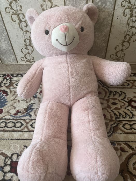 Милый плюшевый медвежонок