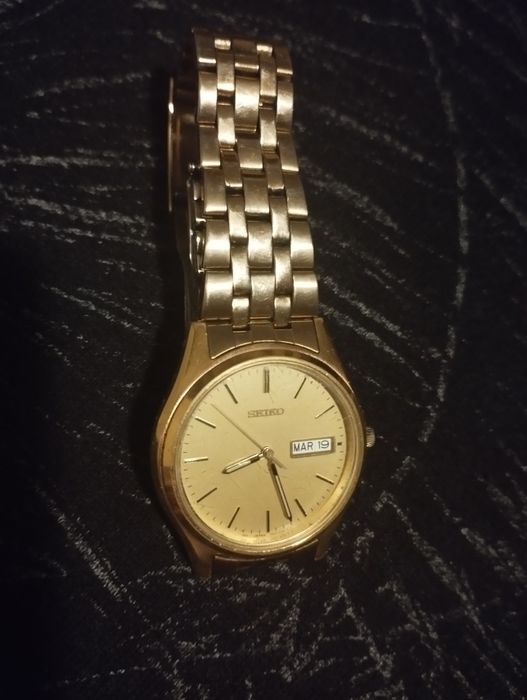 Ceas,SEIKO,aurit,galben suflat.(coart))