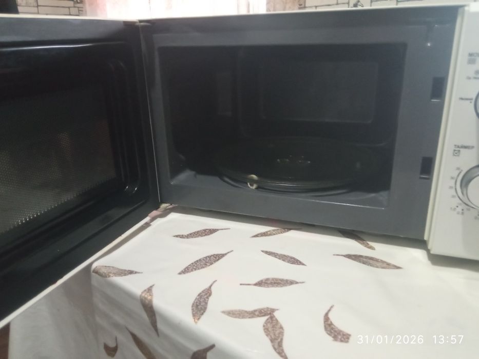 Микравалновка ( Овқат иситгич)