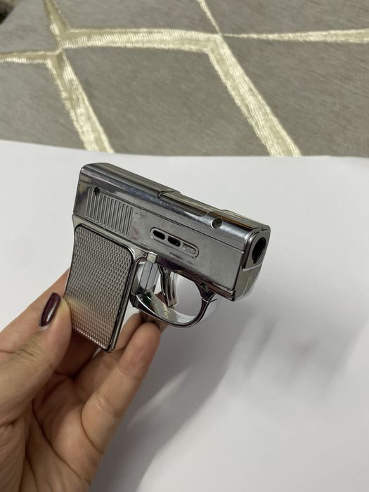 Зажигалка пистолет с часами