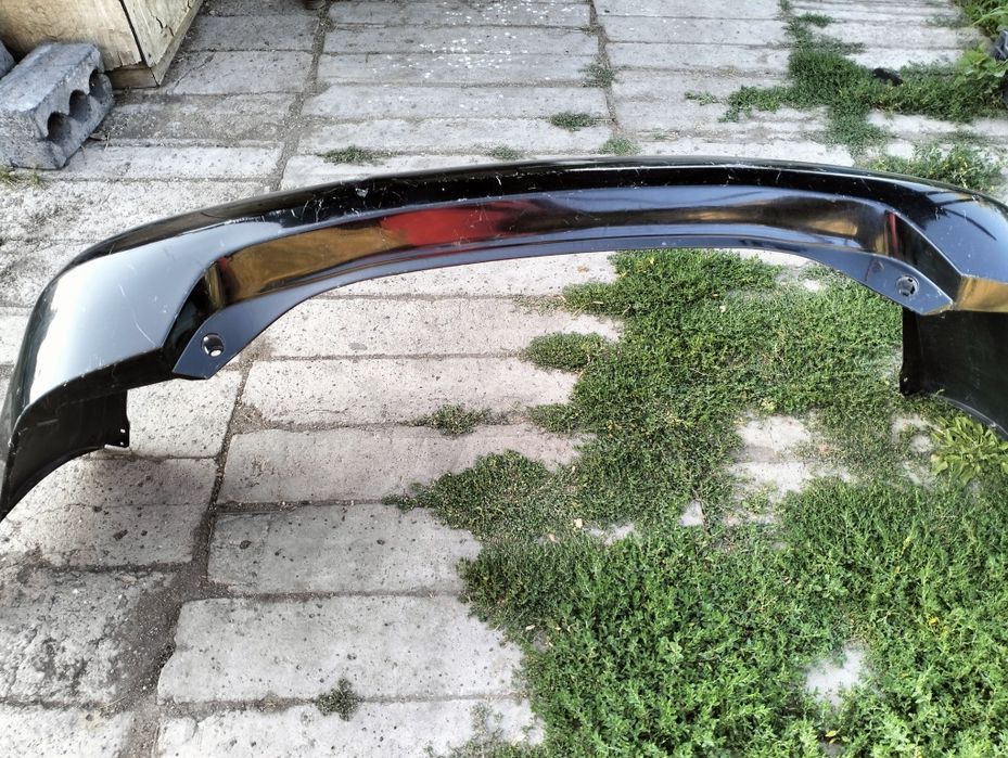 Задний бампер Toyota Camry 40