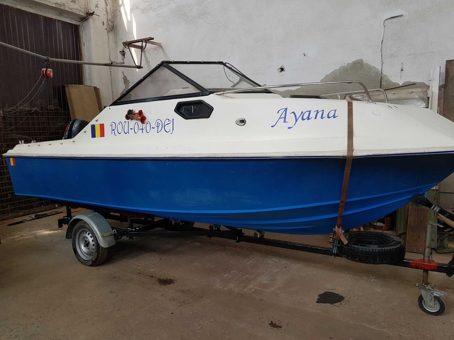 Barca cabinata cu motor SUZUKI 70 si peridoc