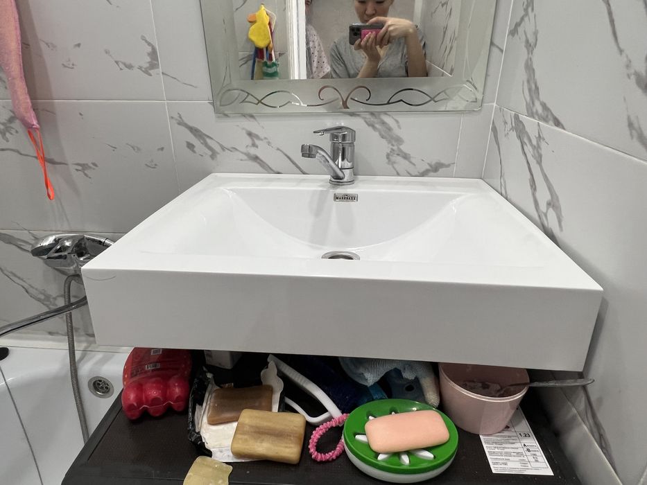 Раковина Қолжуғыш