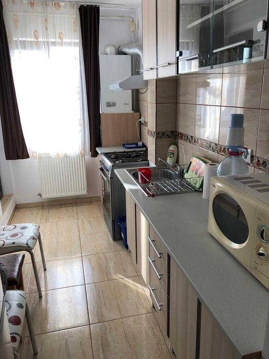 Garsonieră  decomandată și loc parcare privat