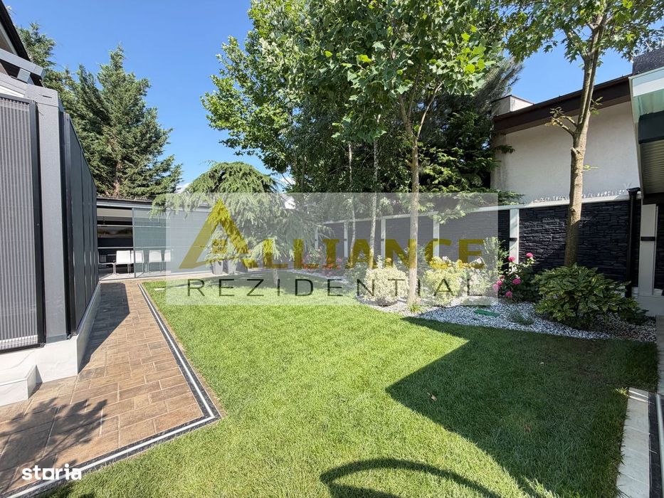 Casa P+1+M cu teren de 650 mp, piscina si curte complet amenajata