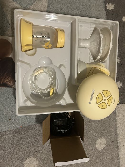 Електрическа двуфазна помпа за кърма Medela Swing Flex™.
