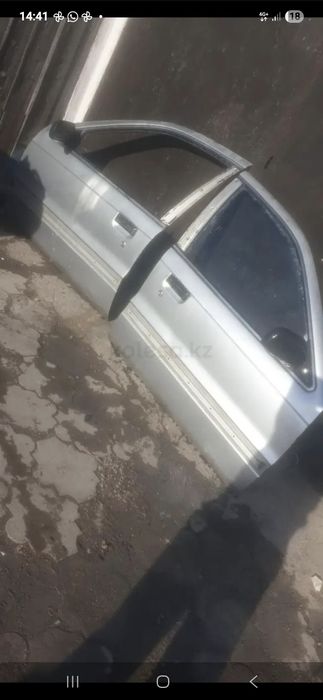 Двери митсубиси лансер