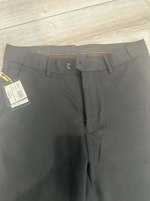 Школьные брюки на мальчика новые