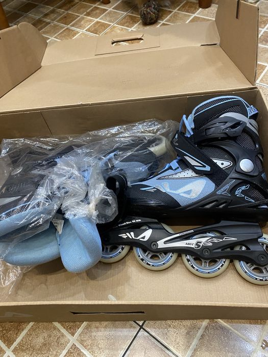 Роликовые коньки