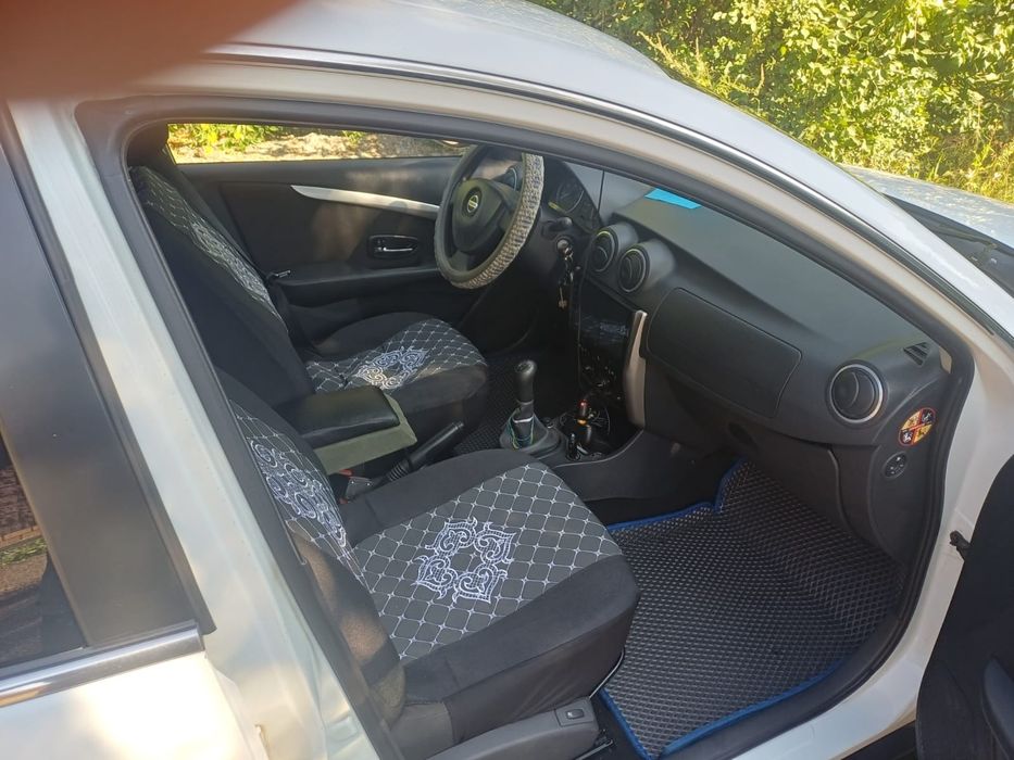Nissan Almera 2014 1.6 л