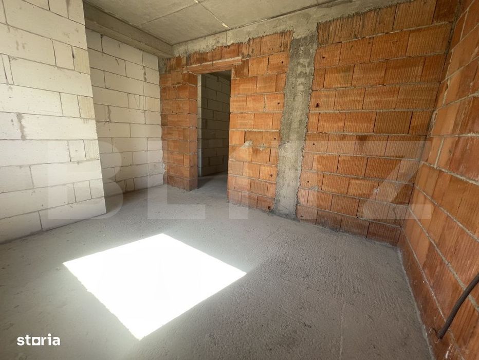 Apartament cu 3 camere, dispus pe doua niveluri, cu gradina