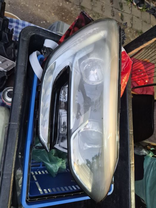 Faruri duster stanga dreapta facelift origine gri si alb   Y  lodgy,doker,ford logan corsa D