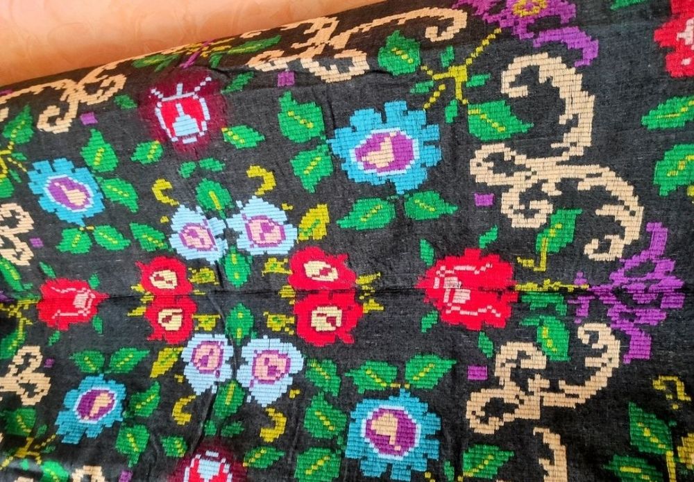 Cuvertura tesuta manual