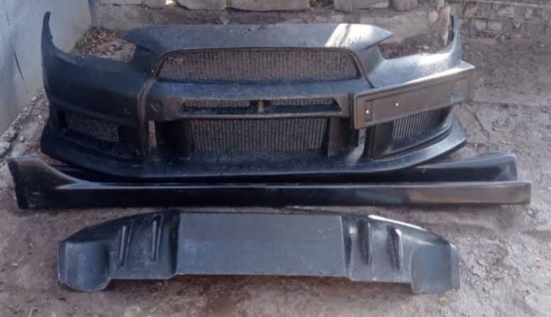 Бампер Лансер 10 зодиак Эва ГТР