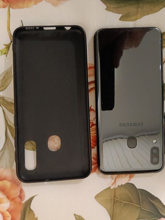 Телефон Самсунг А20Е