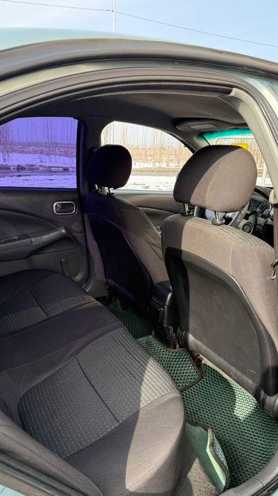 Машина ниссан алмера класик