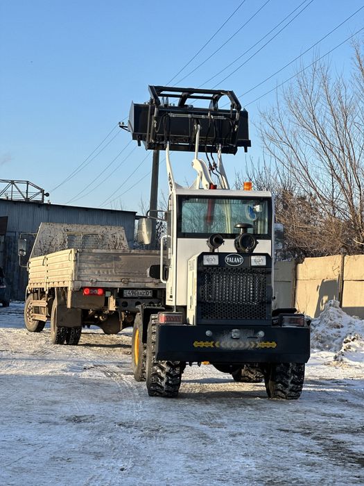 Фронтальный погрузчик 1.5т 0,6куб